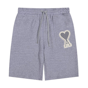 https://cdn.shopify.com/s/files/1/0901/0413/6028/files/ami-heart-shorts-854488.jpg?v=1743324148